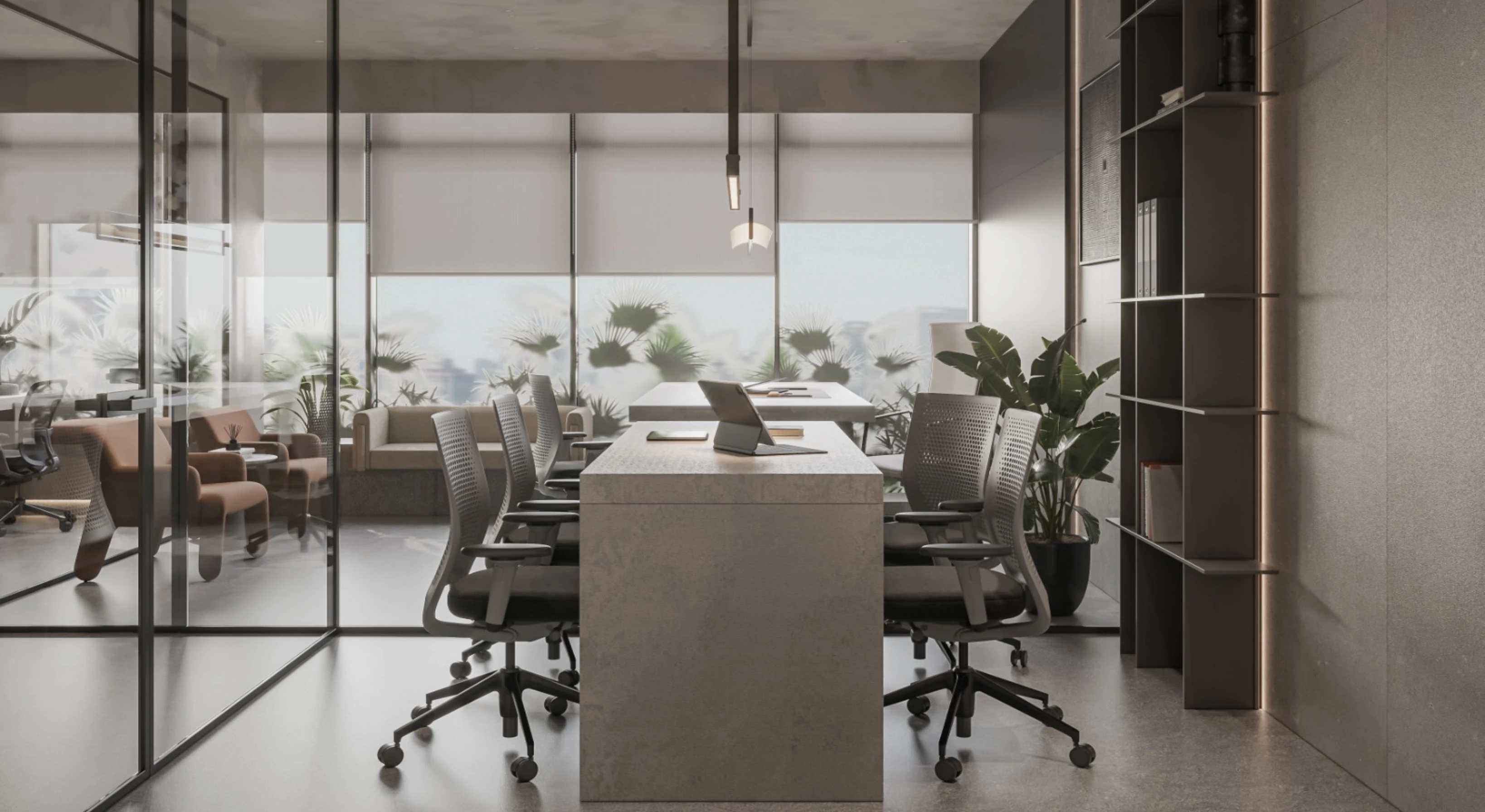 Executive conference room with dark wooden table and black leather chairs