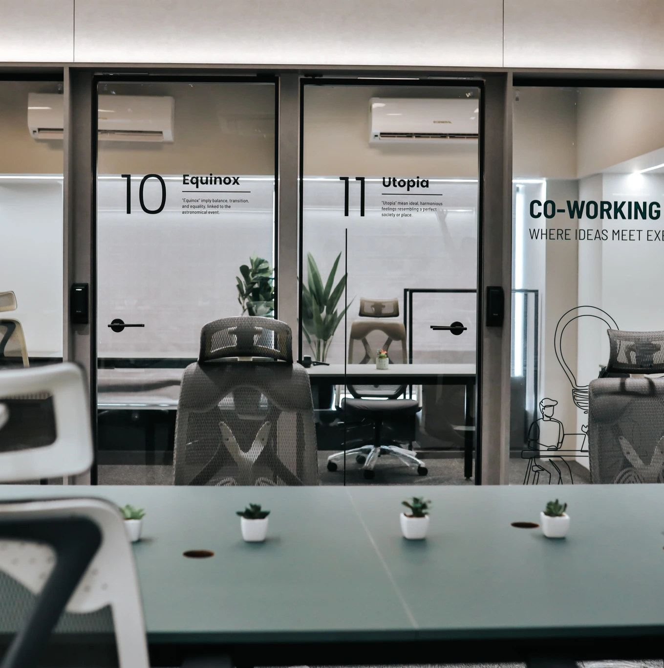 Training room with rows of chairs facing presentation screen