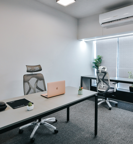 Whiteboard and screen-equipped meeting space at Wibes near Surat Railway Station